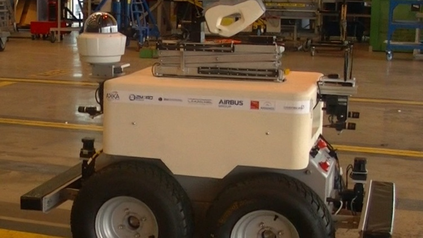 The Air-Cobot inspection robot in a hangar. Physical-inspection context; this is not an InCLAD test platform.
